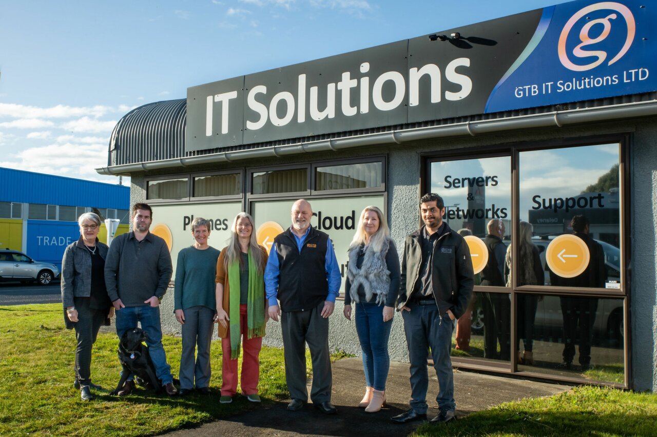 The GTB IT Solution's team standing outside their Kāpiti office.